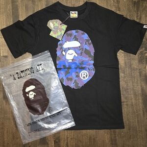 The BAPE Sand Camo Big Ape Head T-shirt in Black Navy is a stylish and versatile